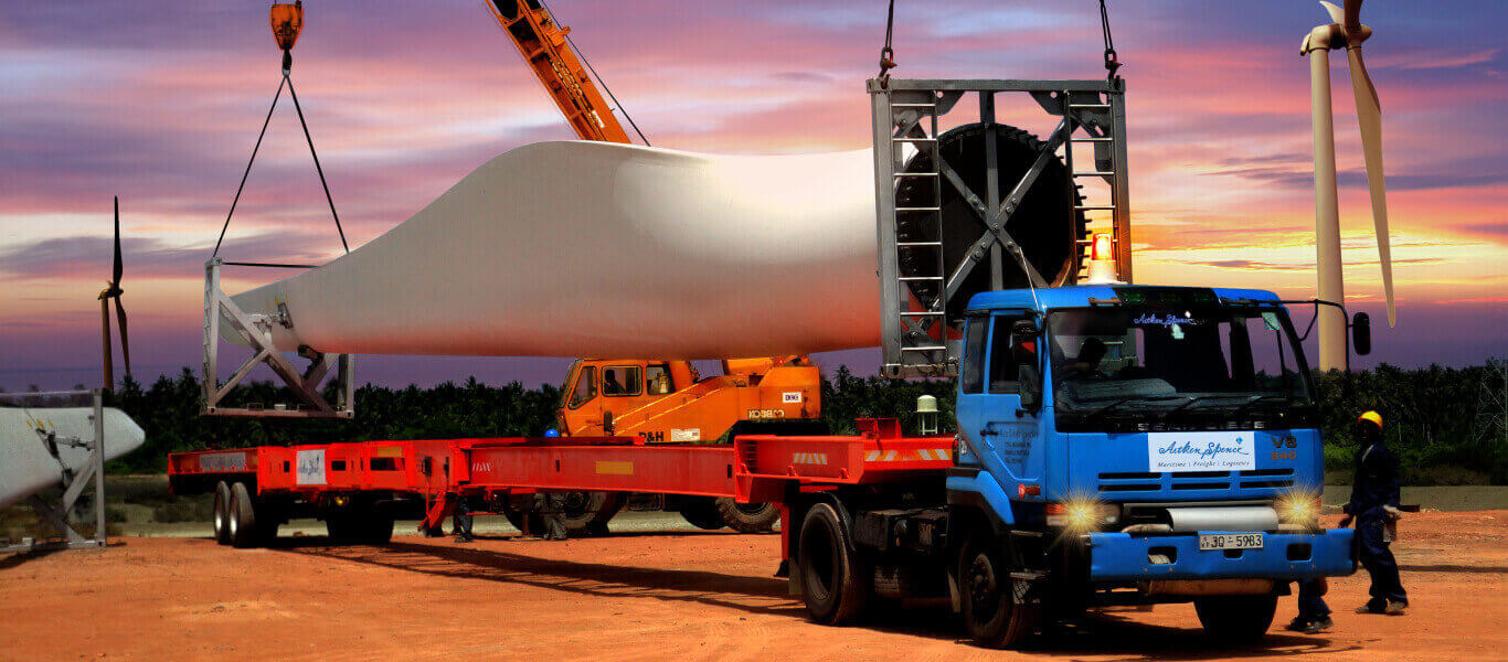 A container truck transporting a wind turbine blade
