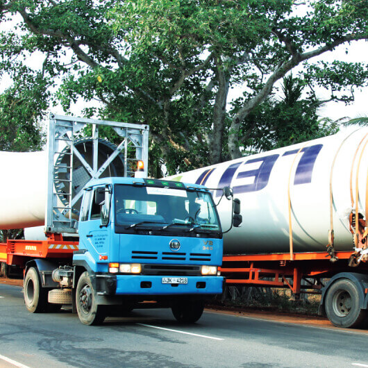 A container truck transporting a wind turbine blades