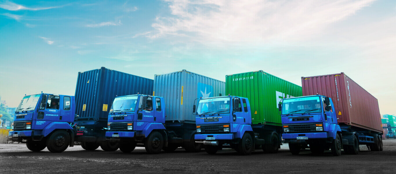 Container trucks parked in the yard